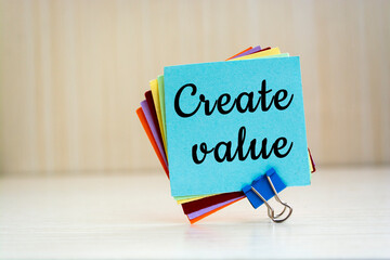 Create value reminder or inspirational advice - handwriting on a sticky note, business and personal development concept