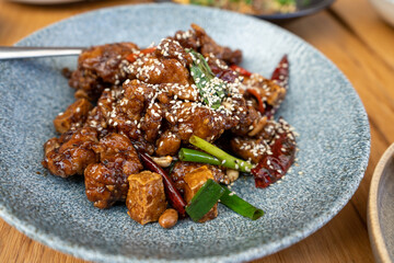 Delicious Kung Pao Chicken with peppers, celery and peanuts.