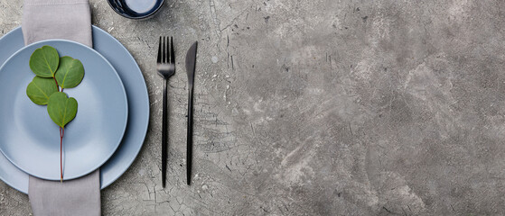 Beautiful table setting on grunge background with space for text