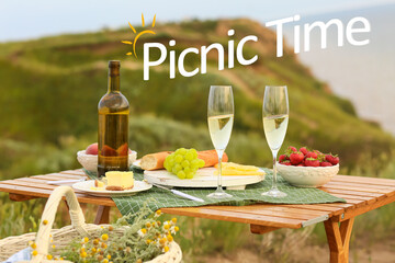 Table served for romantic picnic outdoors