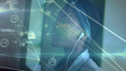 Animation of network of connections over african american schoolgirl using headphones - Powered by Adobe