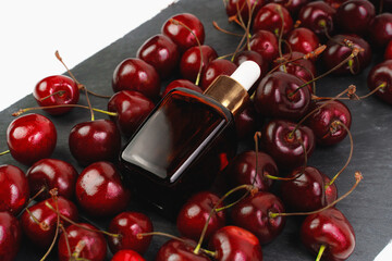 Essence for the face lies on the cherry. Serum for healthy skin. Cosmetics Unisex. Mocap