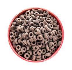 Bowl of black cereal rings on white background