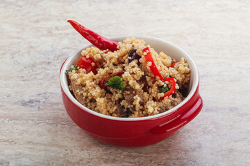 Arabic cous cous with meat and tomato