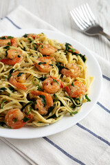 Homemade One-Pot Lemon Garlic Shrimp Pasta on a Plate, side view.