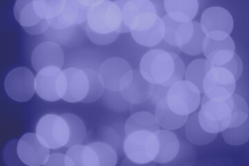 Defocused garland lights for sublimation and design. Trendy color Very Peri for scrapbooking abstract background with blurred circles