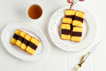 Mini Spiku Lapis Surabaya, Three Layer Cake Originated from Surabaya, Indonesia. Served with Tea