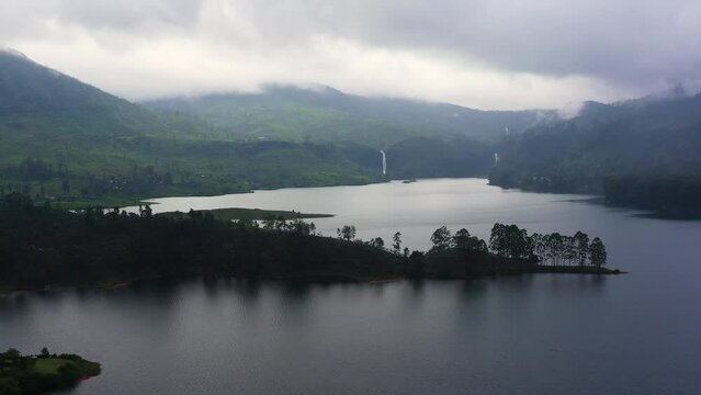 Aerial view of Lake in the mountains among the tea plantations. Maskeliya, Maussakelle reservior, Sri Lanka.