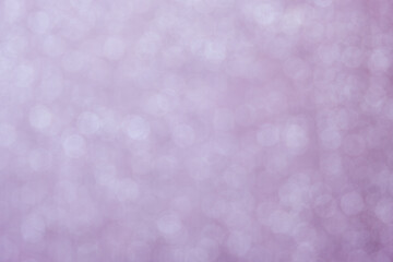 Pink bokeh circle abstract shining background. Blurred glittering wallpaper.