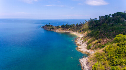 Fototapeta na wymiar Promthep Cape is one of the most photographed locations in Phuket. Phromthep cape viewpoint at blue sea sky in Phuket, Thailand.