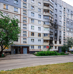 Destroyed and burned apartments in a multi-storey residential building. Residential area Saltovka....