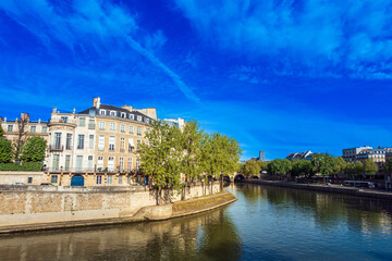 Fototapeta premium PARIS, FRANCE - APRIL 8, 2022: Street view of river Seine in Paris city, France.
