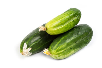 Three cucumbers on a white background.