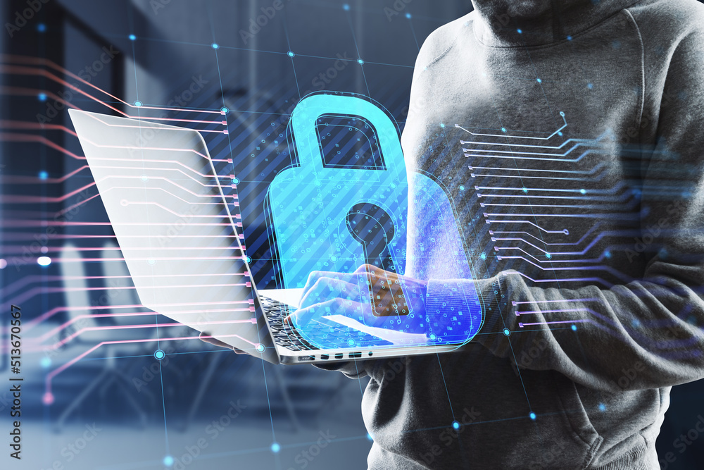 Poster hacker in hoodie using laptop with glowing padlock hologram and lines on blurry office interior back