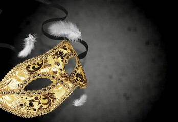 Venetian masks on dark background. New year, Christmas, Purim, Mardi Gras party celebration design banner. Carnival masquerade costume ball