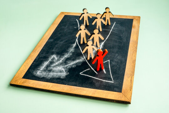 The figurine leads the crowd with changed direction.