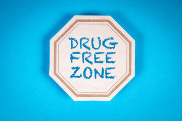 Drug Free Zone. Text on a decorative label sheet.Blue background