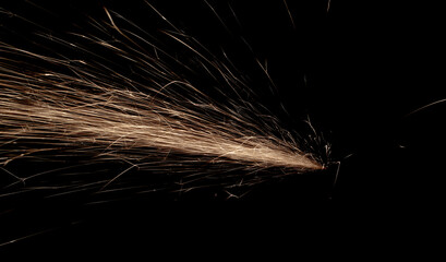 lines of light. sparks in the dark