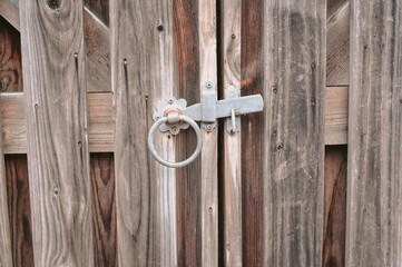 Lock on the old vintage wooden door copy space. High quality photo