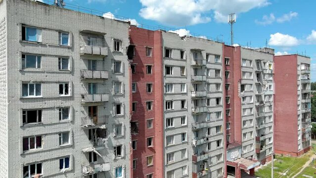 Chernihiv, Ukraine - June 27, 2022: War in Ukraine. Damaged ruined multi-storey house in ukrainian city Chernihiv near Kyiv on north of Ukraine. Ruins during War of Russia against Ukraine.
