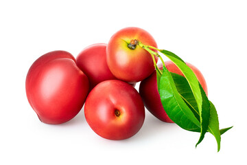 Group of nectarines with leaves isolated by clipping paths on a white background. The concept of a summer harvest and ripe delicious fruits in nutrition