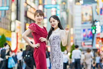 Two women posing in downtown