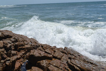 waves crashing on rocks
