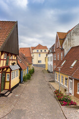 Street with old houses in historic city Sonderborg, Denmark