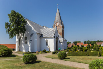 Historic white church in the center of Mogeltonder, Denmark