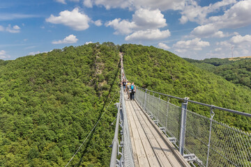 Green hills with spectacular  suspension bridge near Morsdorf, Germany