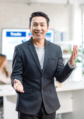 Portrait shot Asian happy cheerful smart confident millennial professional successful male businessman entrepreneur in casual blazer suit standing crossed arms smiling in company office meeting room