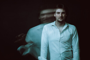 schizophrenic abstract blurry portrait of man with mental disorders and mental illnesses on dark background