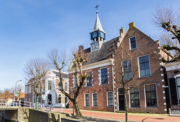 Fototapeta premium Historic town hall at the canal in Balk, Netherlands