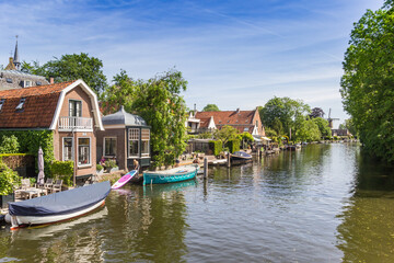 Fototapeta na wymiar Old houses on the river Vecht in Loenen, Netherlands