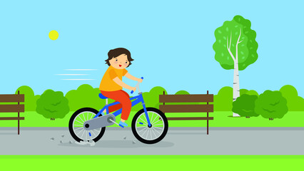 The boy rides a bicycle and ran into a stone