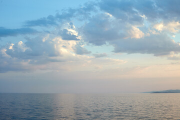 Fototapeta na wymiar Clouds under the sea near Greece ilands