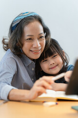 Happy moment of Daughter enjoying time together with mother at home. little child girl having fun.