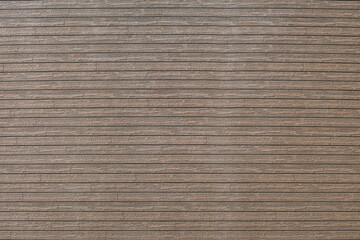 Texture of facade panels imitating wood for exterior decoration of the house