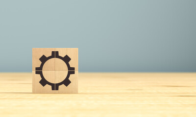 Wooden cubes with the image of a gear. 3d rendering.