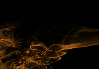 Plumes of Smoke in golden light on a dark background