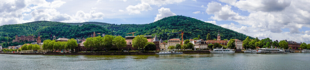 Fototapeta na wymiar View of Heidelberg with the hilly landscape and the Neckar. 
