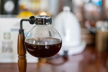 Making coffee with syphon method