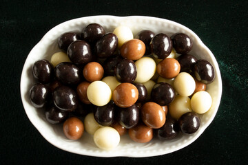 Chocolate covered hazelnuts.  Chocolate balls