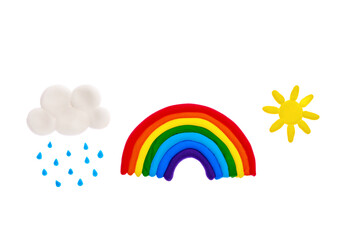 plasticine rainbow, cloud, rain, drops, sun, rays on white background, isolate, plasticine creativity, children's hobby, natural phenomenon concept, children's plasticine background