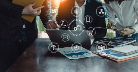 Selective focus hands of business team meeting and working together with customer connection interface icons in the office, Business new start up and Modern technologies for connection concept.