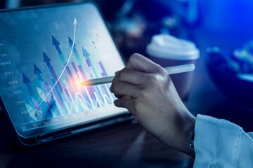 Business people hands working on network and digital finance marketing chart with future technology innovation and digital transformation concept.