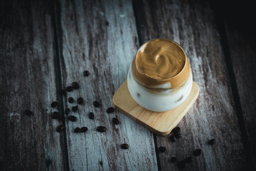 Ice dalgona coffee. Milk and foamy whipped coffee. Trend drink.