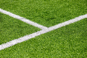 marking lines on a green football field