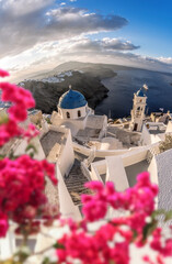 Old Town Thira on the Santorini island with famous churches against sea in Greece.