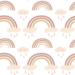 Cute vector seamless pattern with rainbow and clouds on a white background.For printing on children's textiles and accessories.